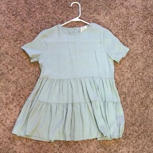 Brand new! Tiered short sleeve shirt.